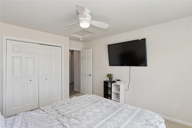 4420 Spring Meadow Pl NE, Cedar Rapids, IA 52411 - bedroom with carpet flooring, a closet, and a ceiling fan