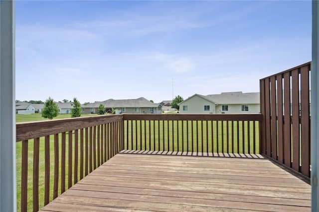1019 Acacia Dr NE, Cedar Rapids, IA 52402 - wooden deck with a residential view and a yard