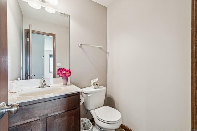 1019 Acacia Dr NE, Cedar Rapids, IA 52402 - bathroom featuring vanity and toilet