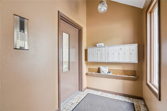 1580 Matterhorn Dr NE, Cedar Rapids, IA 52402 - doorway to outside with baseboards