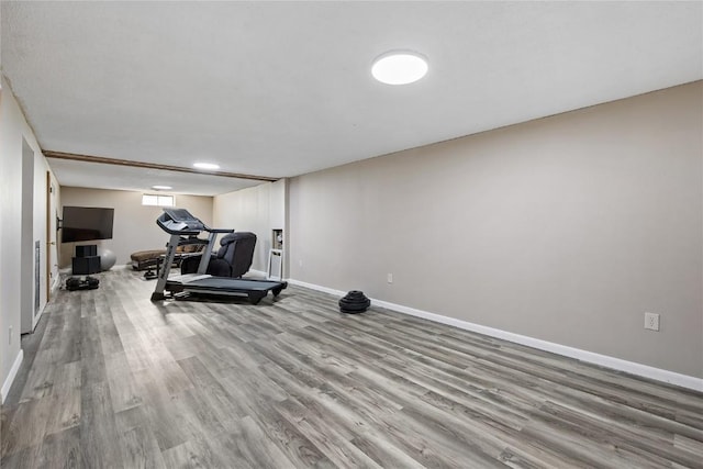 105 E Clark St, Hiawatha, IA 52233 - workout area with wood finished floors and baseboards