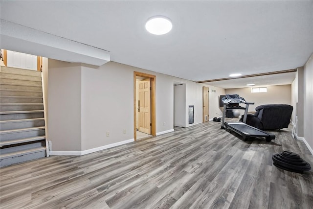 105 E Clark St, Hiawatha, IA 52233 - exercise room featuring wood finished floors