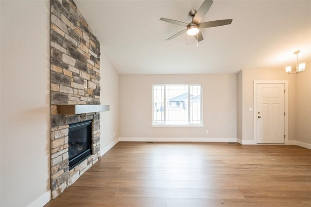6188 Cope Dr, Marion, IA 52302 - unfurnished living room with a fireplace, wood finished floors, and ceiling fan