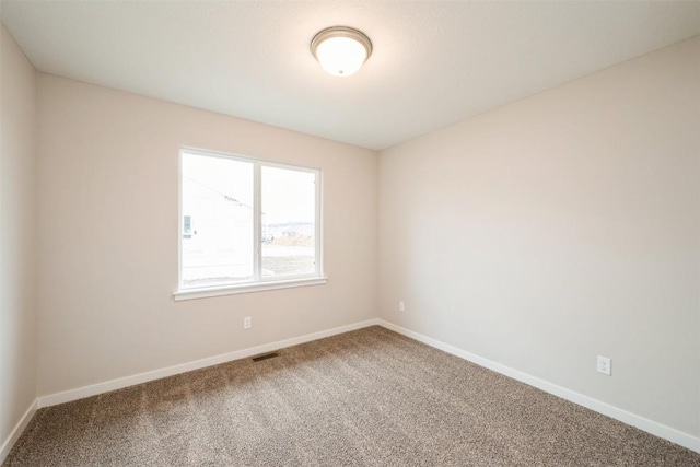 6188 Cope Dr, Marion, IA 52302 - empty room with carpet floors and baseboards