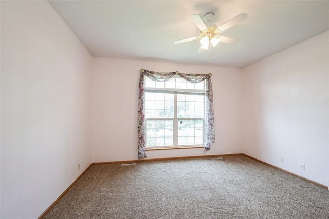 1641 Greens Way Ct, Cedar Rapids, IA 52402 - spare room featuring carpet floors and ceiling fan