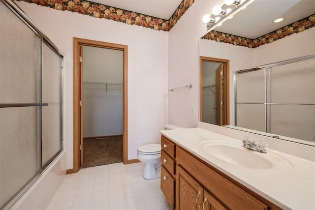 1641 Greens Way Ct, Cedar Rapids, IA 52402 - full bathroom with vanity, tile patterned floors, and a spacious closet