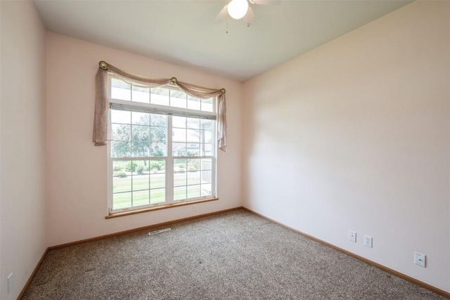 1641 Greens Way Ct, Cedar Rapids, IA 52402 - carpeted spare room featuring baseboards and ceiling fan