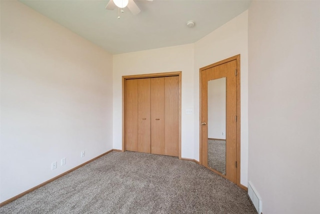 1641 Greens Way Ct, Cedar Rapids, IA 52402 - unfurnished bedroom with carpet floors, a closet, and ceiling fan