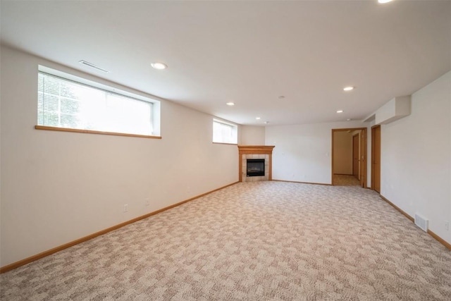 1641 Greens Way Ct, Cedar Rapids, IA 52402 - basement featuring recessed lighting, carpet flooring, and a tiled fireplace