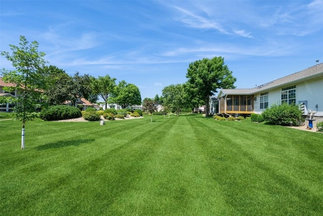 1641 Greens Way Ct, Cedar Rapids, IA 52402 - view of green lawn featuring a sunroom