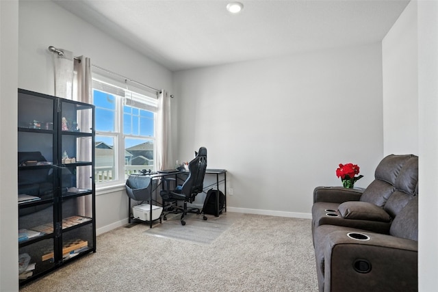 717 E Bear Dr, Tiffin, IA 52340 - carpeted office space featuring baseboards