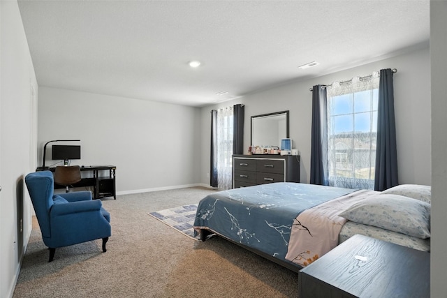 717 E Bear Dr, Tiffin, IA 52340 - carpeted bedroom featuring baseboards