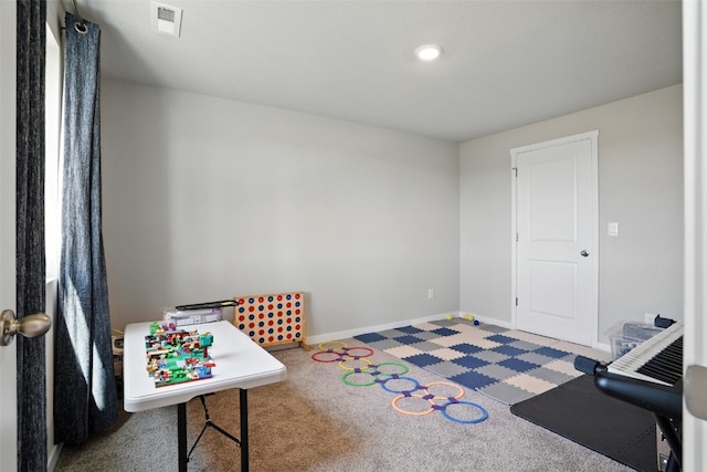 717 E Bear Dr, Tiffin, IA 52340 - rec room featuring carpet floors and baseboards