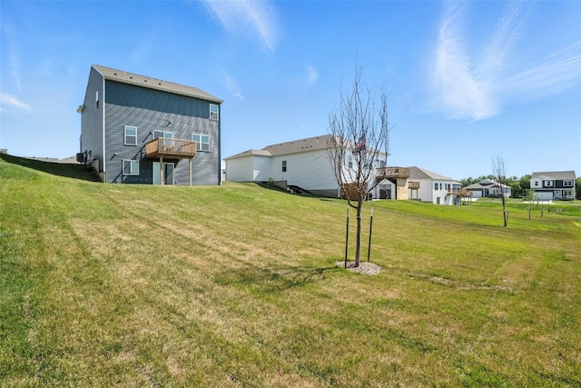 717 E Bear Dr, Tiffin, IA 52340 - view of grassy yard featuring a deck and a residential view