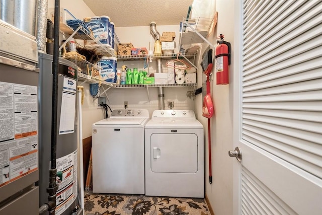 4405 Westchester Dr Unit B, Cedar Rapids, IA 52402 - laundry room featuring washer and clothes dryer and gas water heater