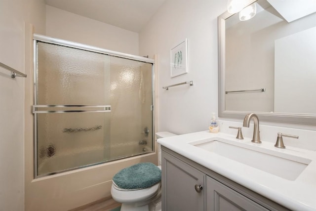 4405 Westchester Dr Unit B, Cedar Rapids, IA 52402 - bathroom with vanity and combined bath / shower with glass door