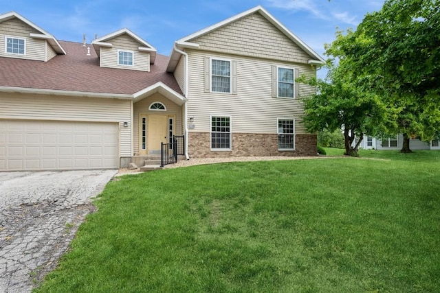 4405 Westchester Dr Unit B, Cedar Rapids, IA 52402 - traditional home with driveway, a front lawn, roof with shingles, and an attached garage