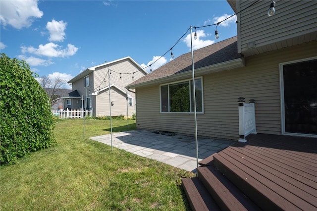 6514 Fox Run Dr SW, Cedar Rapids, IA 52404 - view of yard featuring a wooden deck and a patio area