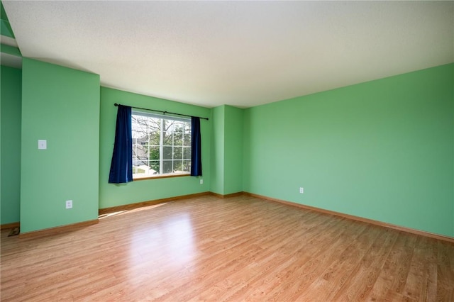 6514 Fox Run Dr SW, Cedar Rapids, IA 52404 - spare room with light wood-style floors and baseboards