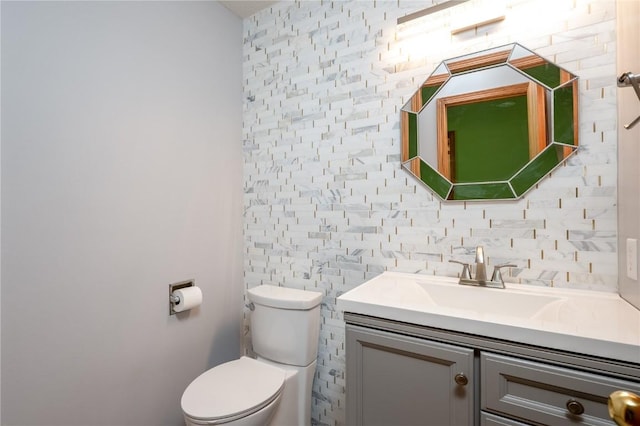 6514 Fox Run Dr SW, Cedar Rapids, IA 52404 - half bathroom featuring vanity and decorative backsplash