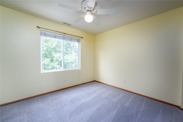 6514 Fox Run Dr SW, Cedar Rapids, IA 52404 - spare room featuring carpet flooring and ceiling fan