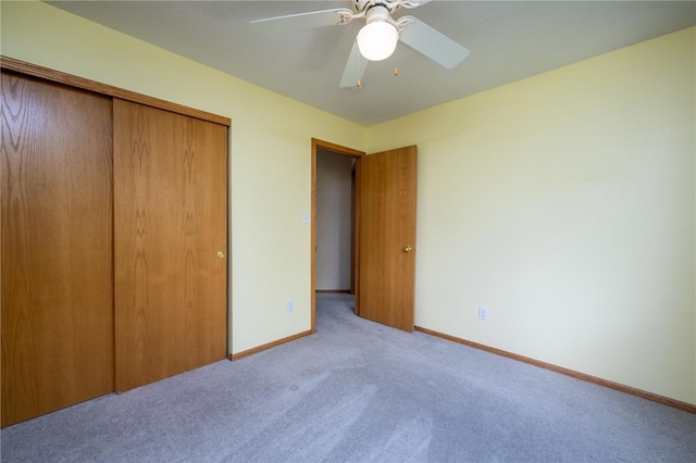 6514 Fox Run Dr SW, Cedar Rapids, IA 52404 - unfurnished bedroom with carpet flooring, a closet, and ceiling fan