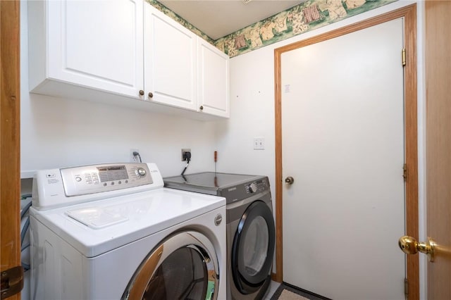 6514 Fox Run Dr SW, Cedar Rapids, IA 52404 - laundry room featuring separate washer and dryer and cabinet space