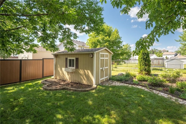 6514 Fox Run Dr SW, Cedar Rapids, IA 52404 - view of shed with a fenced backyard