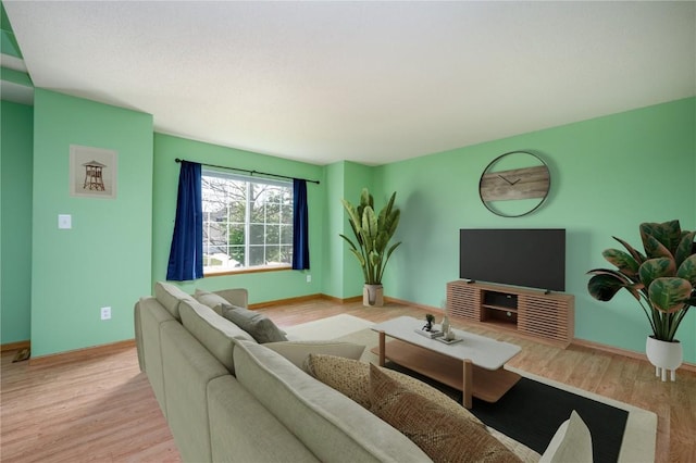6514 Fox Run Dr SW, Cedar Rapids, IA 52404 - living room featuring wood finished floors and baseboards