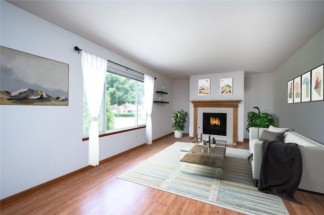 6514 Fox Run Dr SW, Cedar Rapids, IA 52404 - living room with wood finished floors and a fireplace