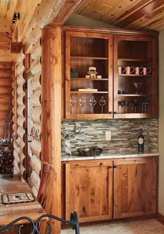 140 Falcon Dr, Montezuma, IA 50171 - indoor dry bar featuring vaulted ceiling, backsplash, and wood ceiling