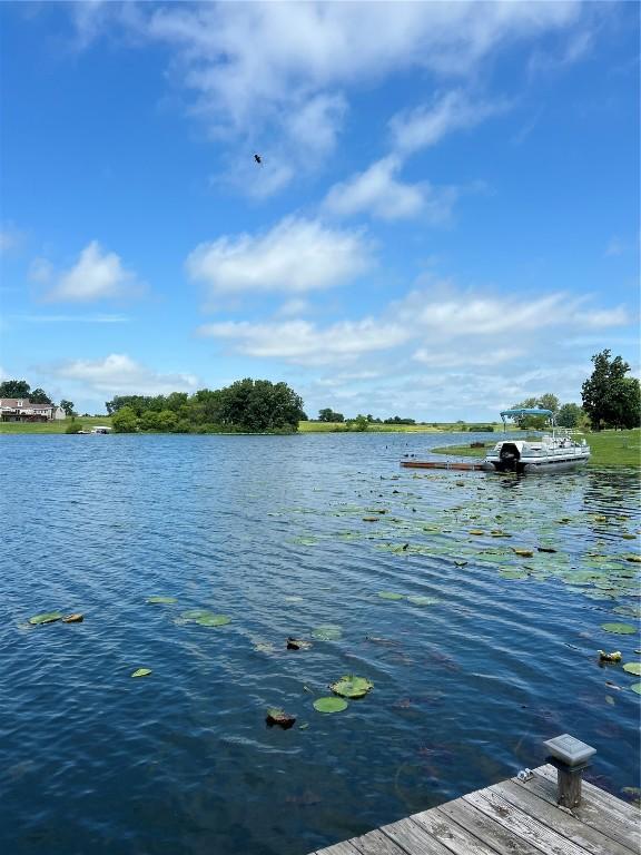 140 Falcon Dr, Montezuma, IA 50171 - dock area featuring a water view