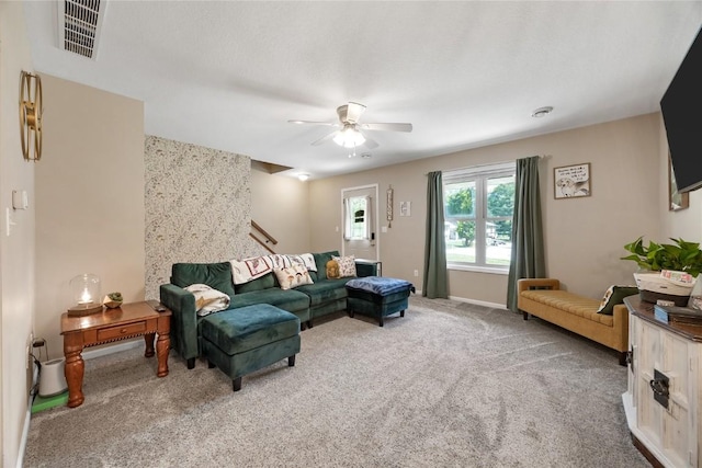 114 Therese Ave, Anamosa, IA 52205 - carpeted living area with ceiling fan