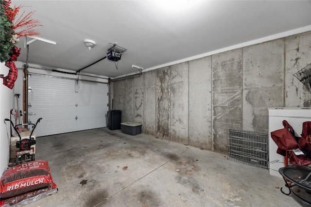 114 Therese Ave, Anamosa, IA 52205 - garage with a garage door opener