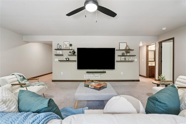 713 Hillside Dr, Tiffin, IA 52340 - living room featuring carpet and a ceiling fan
