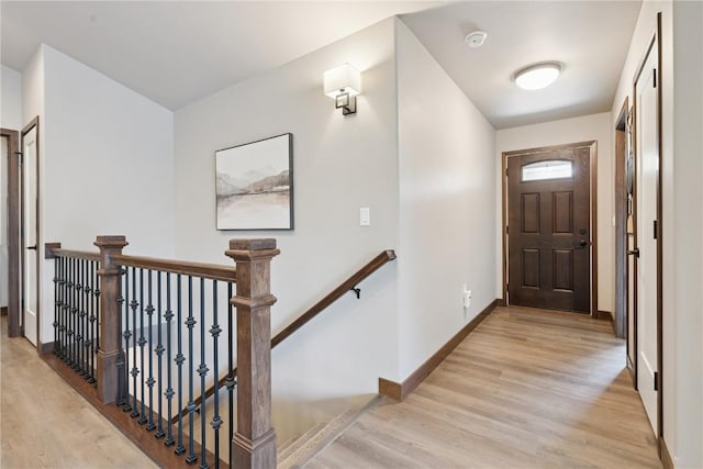 713 Hillside Dr, Tiffin, IA 52340 - foyer with light wood finished floors and baseboards