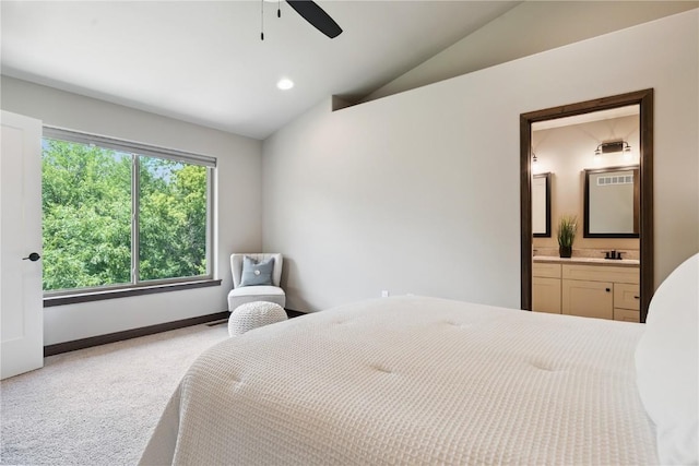 713 Hillside Dr, Tiffin, IA 52340 - carpeted bedroom featuring vaulted ceiling, ensuite bath, a ceiling fan, and recessed lighting