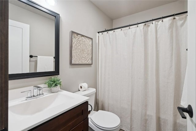 713 Hillside Dr, Tiffin, IA 52340 - full bathroom with vanity and a shower with curtain