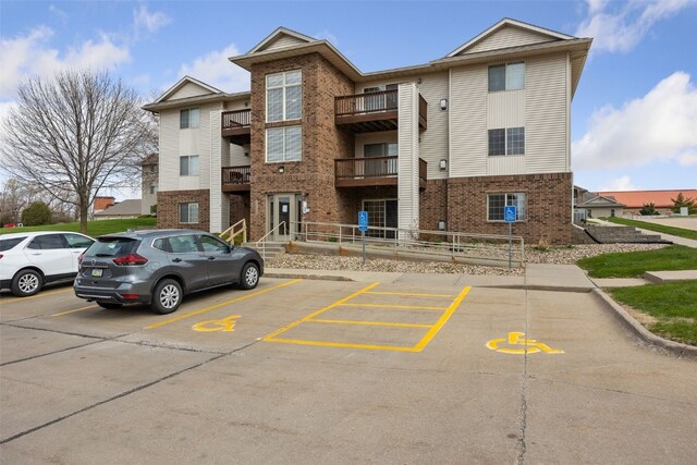 3120 Wilson Ave SW Unit 2, Cedar Rapids, IA 52404 - view of property featuring uncovered parking