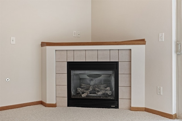3120 Wilson Ave SW Unit 2, Cedar Rapids, IA 52404 - detailed view of carpet floors and a fireplace