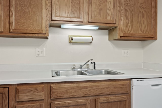 3120 Wilson Ave SW Unit 2, Cedar Rapids, IA 52404 - kitchen with white dishwasher and light countertops