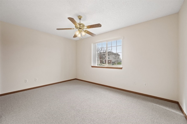 3120 Wilson Ave SW Unit 2, Cedar Rapids, IA 52404 - spare room featuring carpet flooring, a ceiling fan, and a textured ceiling