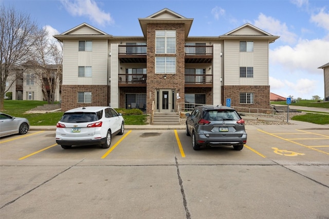 3120 Wilson Ave SW Unit 2, Cedar Rapids, IA 52404 - view of building exterior featuring uncovered parking
