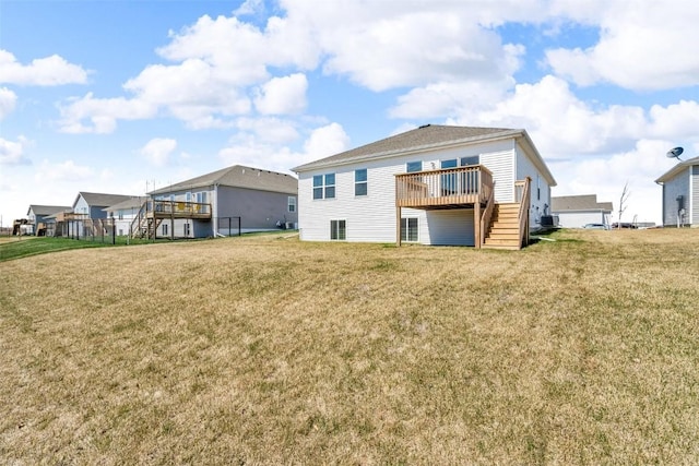 305 Sumac Dr, Palo, IA 52324 - rear view of property with stairway, a wooden deck, and a yard