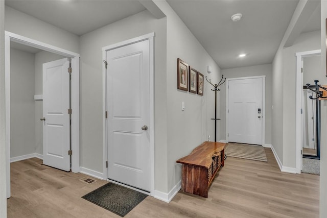 305 Sumac Dr, Palo, IA 52324 - entryway with light wood-style floors and recessed lighting