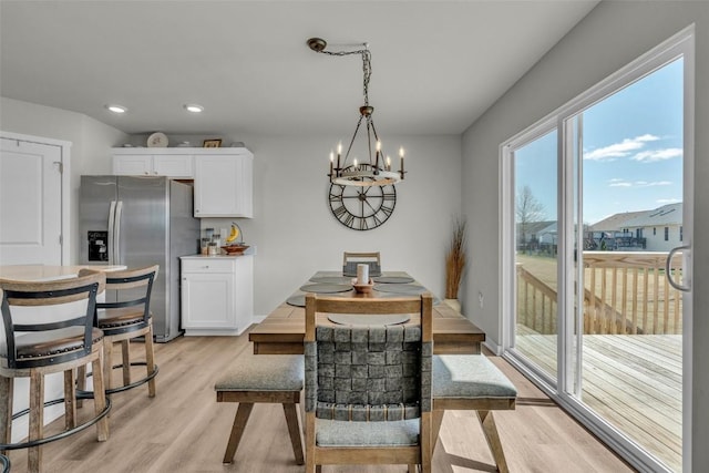 305 Sumac Dr, Palo, IA 52324 - dining space with a chandelier, light wood-style floors, and recessed lighting