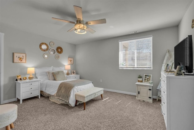 305 Sumac Dr, Palo, IA 52324 - bedroom with light carpet and ceiling fan