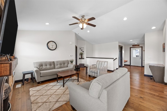 210 Northgate St NW, Shellsburg, IA 52332 - living room featuring a ceiling fan, vaulted ceiling, light wood finished floors, and recessed lighting