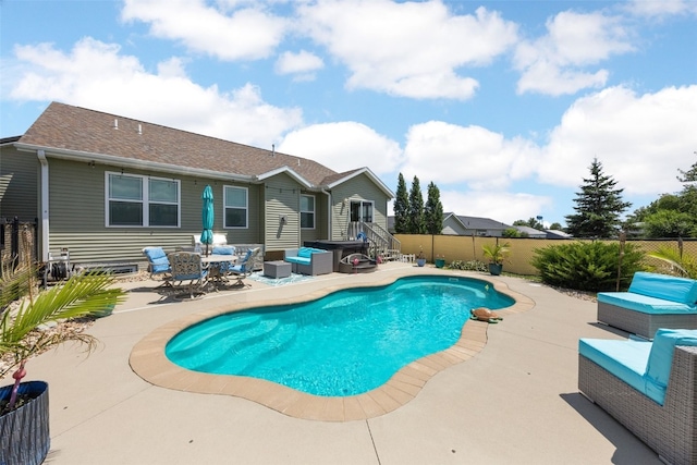 210 Northgate St NW, Shellsburg, IA 52332 - view of swimming pool featuring a patio, a fenced backyard, and an outdoor hangout area
