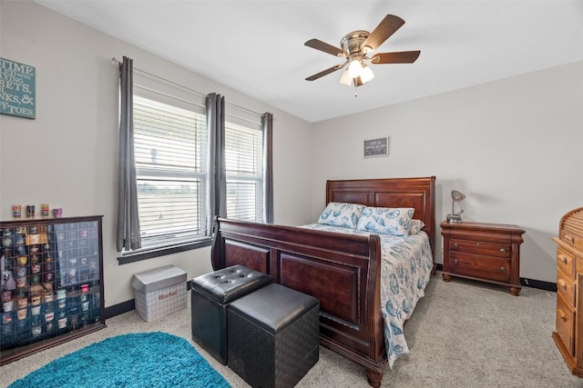 210 Northgate St NW, Shellsburg, IA 52332 - bedroom with light carpet and ceiling fan